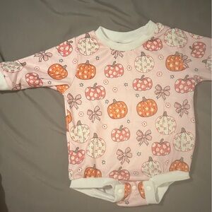 Boutique pumpkins and bows bubble romper